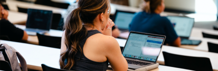 Students working on laptop in class. 