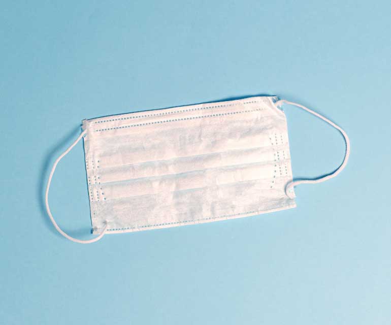 facemask on blue background