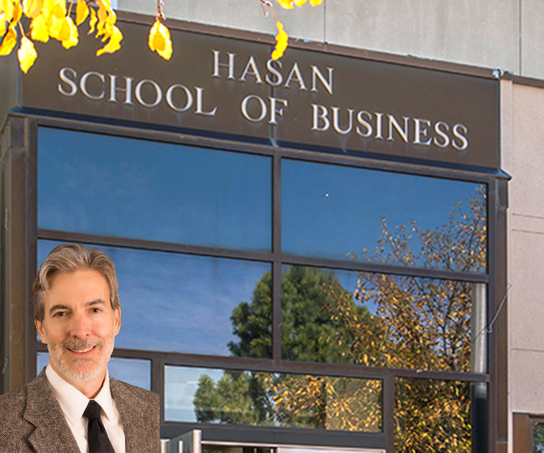 Professor in front of HSB building