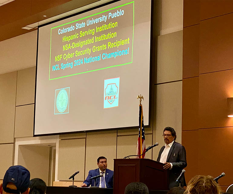 Dr. Roberto Mejias and President Roberto Valdez at the CSU Pueblo/CISA Career summit at the school.