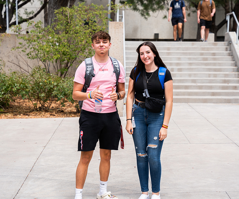 two students smiling