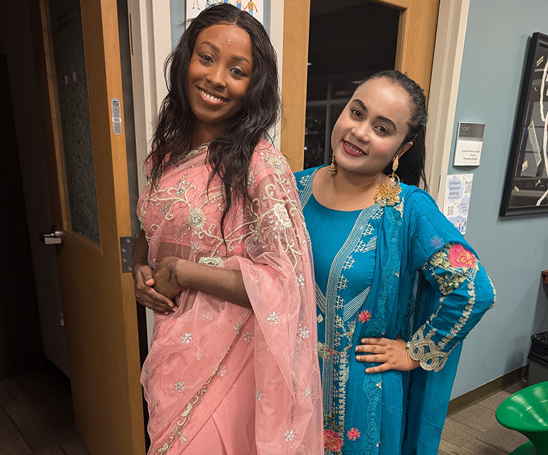 two students smiling