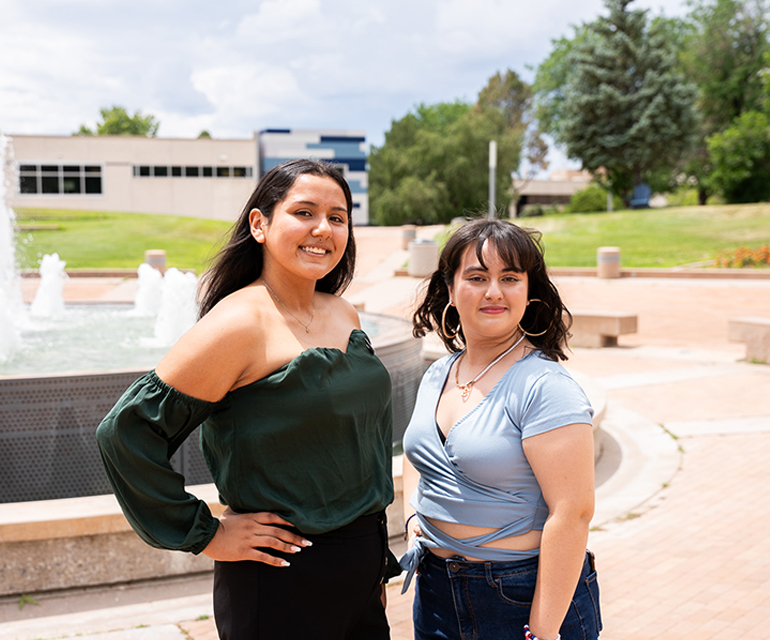 two students smiling