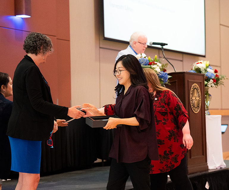 staff member receiving award