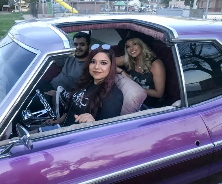 Taciana Torrez (driver), Vanessa Torrez, and Raul Ramirez participate in the car show during 2018 Cinco de Mayo celebration in Pueblo photo from CPR.org